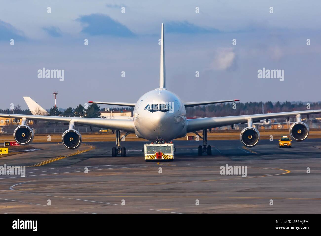 Towing A Large Wide Body Aircraft At The Airport Front View Straight Stock Photo Alamy