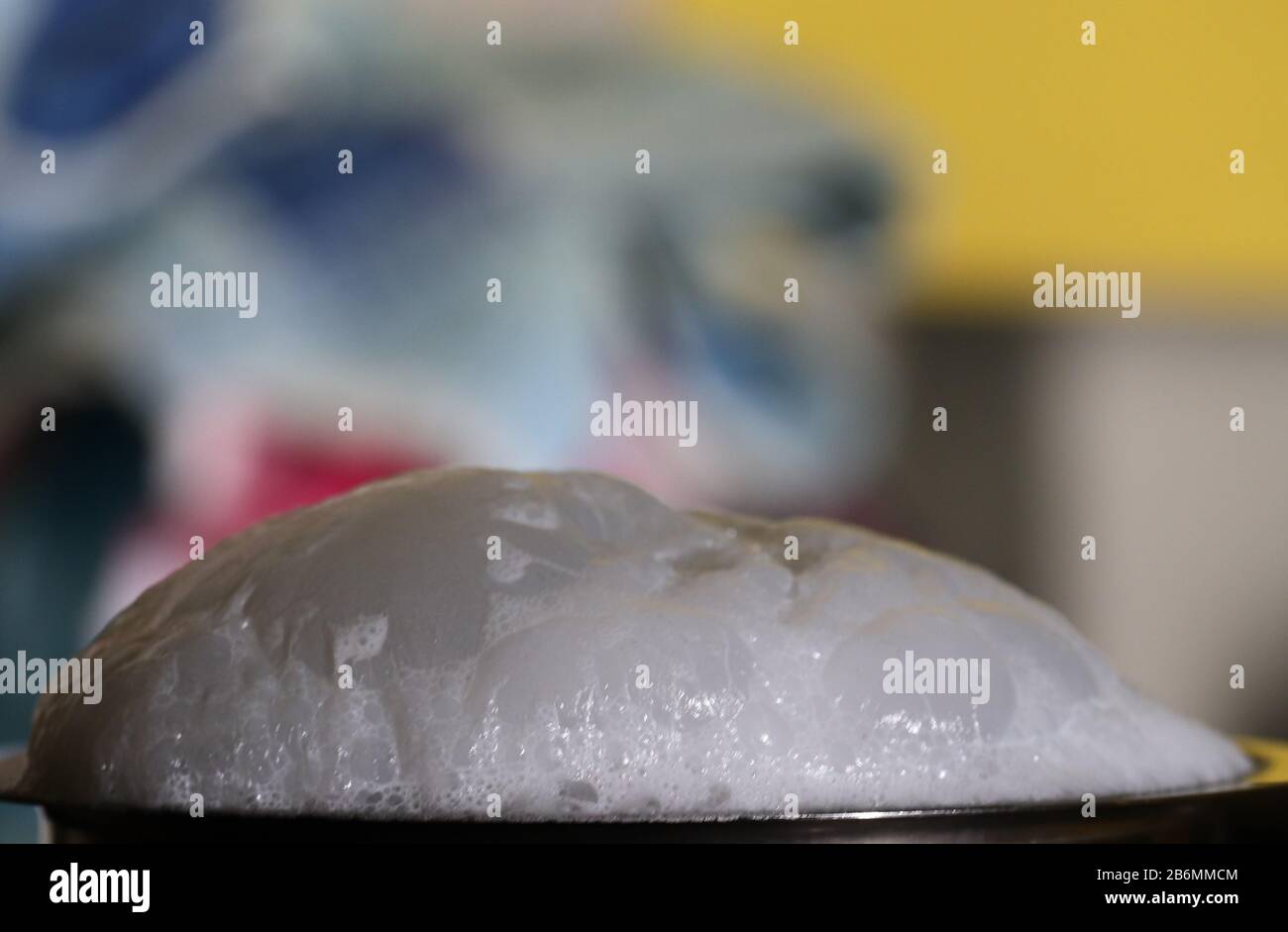 Closeup of Boiling milk on stove Stock Photo Alamy