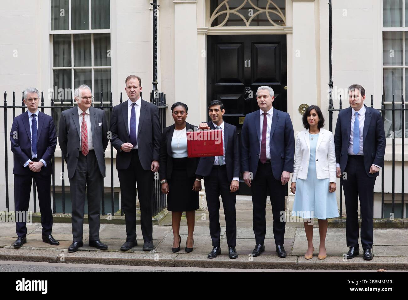 London, London, UK. 11th Mar, 2020. Rishi Sunak (4th R), Britain's Chancellor of the Exchequer, poses for a picture with members of his treasury team as he leaves 11 Downing Street to deliver his budget to Parliament, in London, Britain on March 11, 2020. Credit: Tim Ireland/Xinhua/Alamy Live News Stock Photo