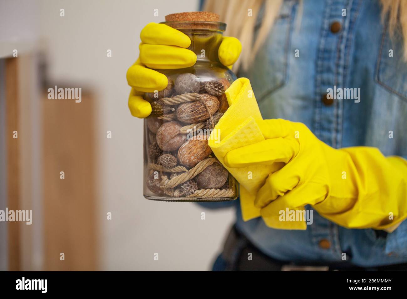 Closeup of worker hand wiping dust in office Stock Photo - Alamy