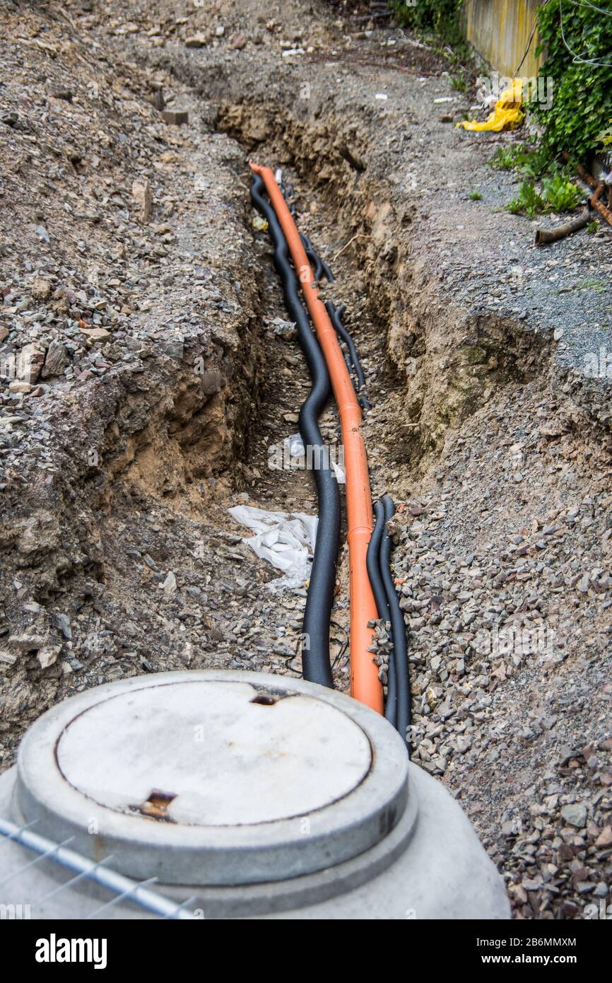 Drainage ditch with sewer pipe made of concrete Stock Photo