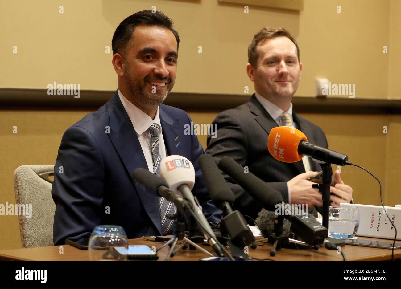 Lawyer Aamer Anwar (left) speaks to the media at the Marriott Hotel, Glasgow, after the Scottish Criminal Cases Review Commission found that a miscarriage of justice may have occurred in the conviction of Abdelbaset al-Megrahi for the Lockerbie bombing, paving the way for a new appeal. Stock Photo