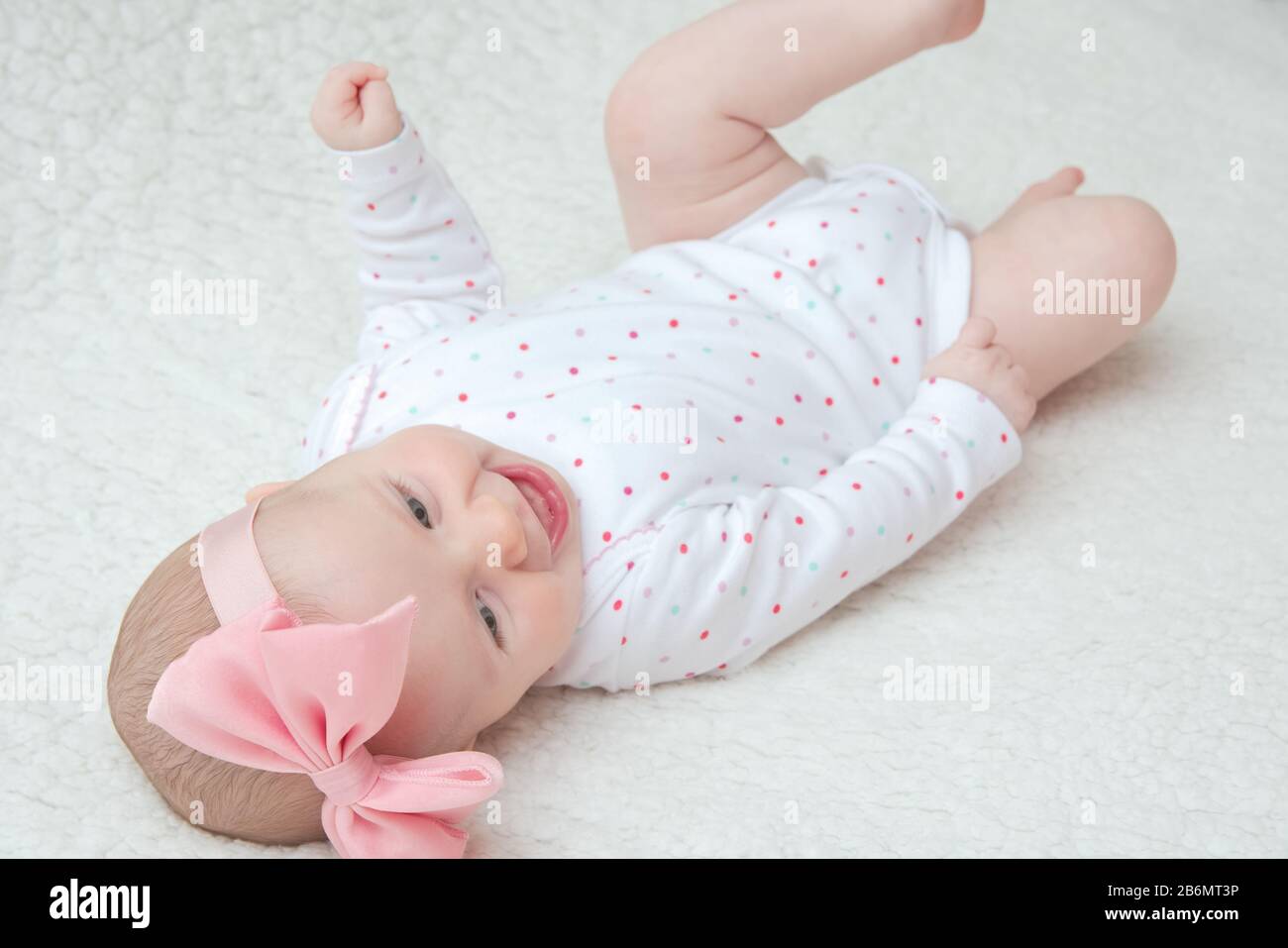 Adorable Baby Girl with Pink Hair Band Posing on Photoshoot Stock Photo ...