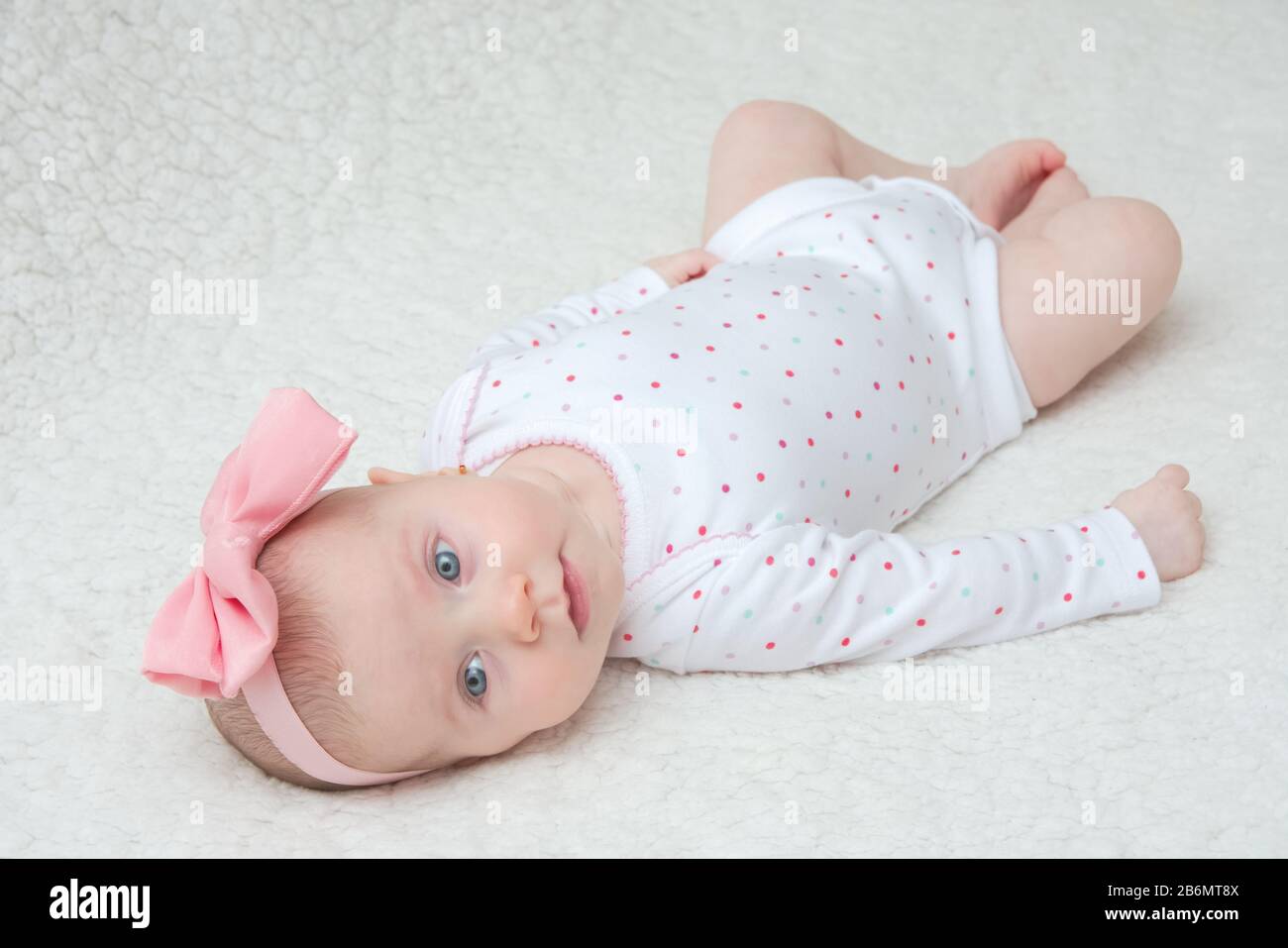 Adorable Baby Girl with Pink Hair Band Posing on Photoshoot Stock Photo ...