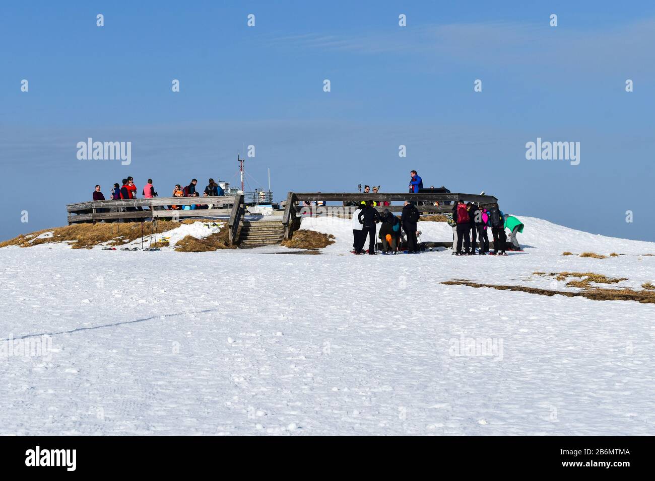 Feldberg, Germany - January 25, 2020: Group of hikers at 1,493 metres (4,898 ft) the Feldberg in the Black Forest. Stock Photo