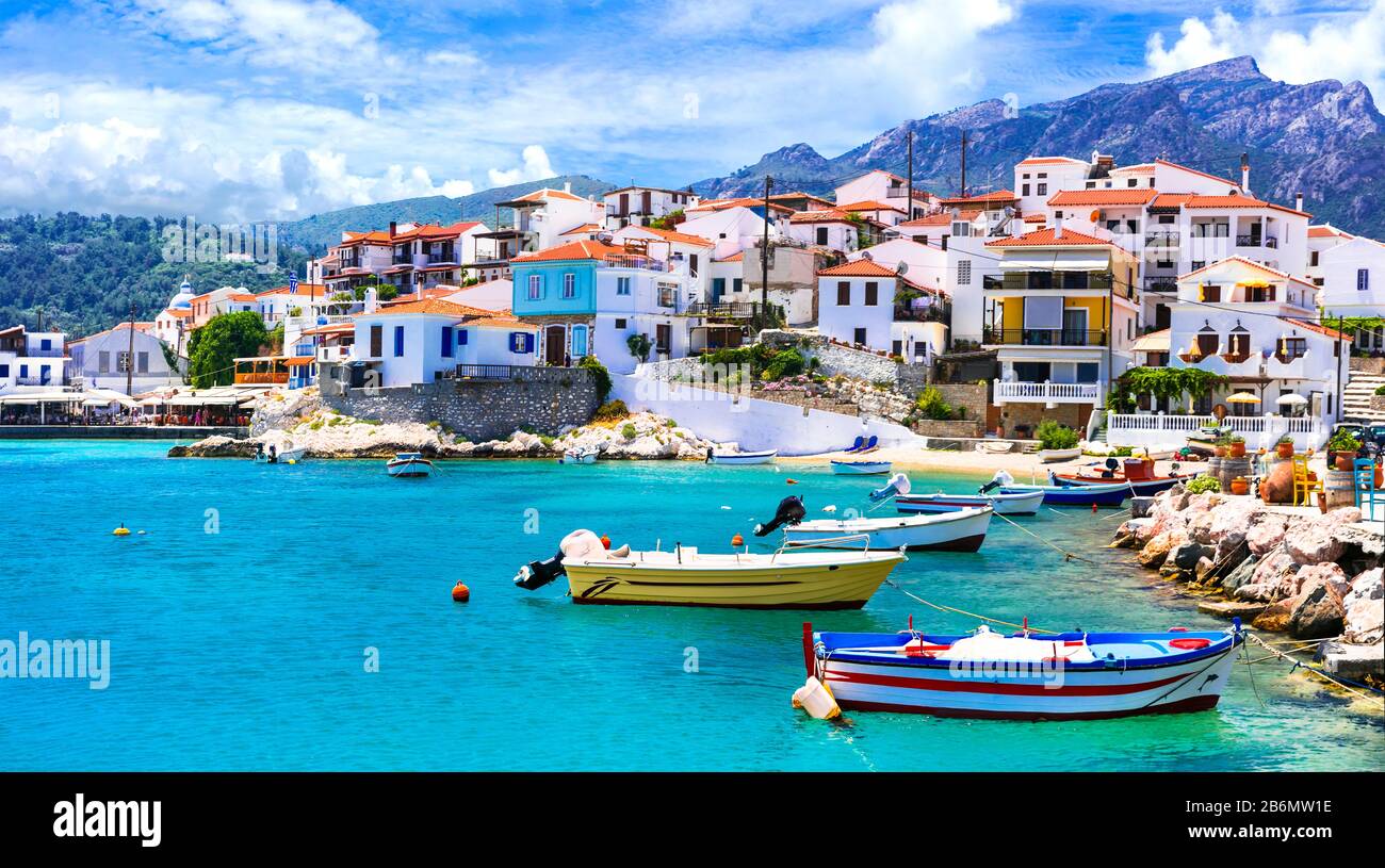 Turquoise sea,colorful houses and mountains,Kokkari village,Samos island,Greece. Stock Photo