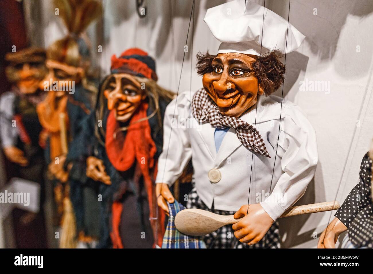 Colorful wooden puppets dolls in the shop Stock Photo Alamy