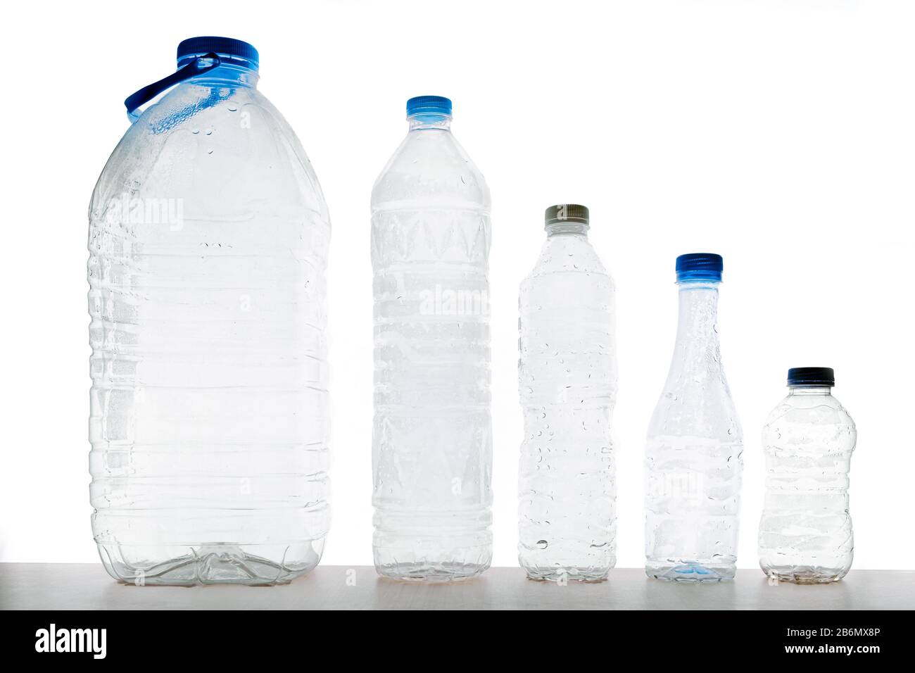 Different size plastic bottle shape in white background Stock Photo Alamy