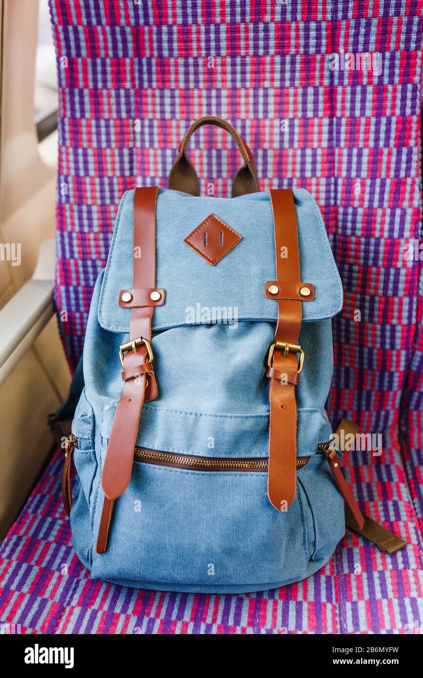 Backpack at the train seat. Travel concept Stock Photo Alamy