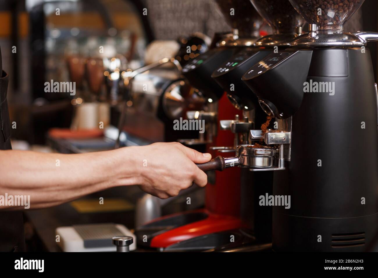 Professional coffee grinder grinding 
