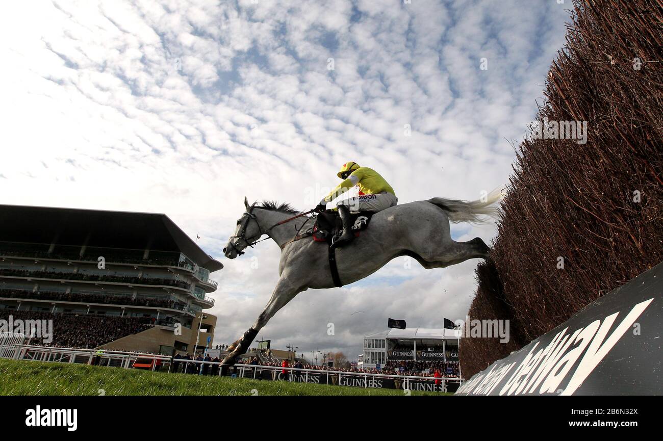 Politologue ridden by jockey Harry Skelton on their way to winning the Betway Queen Mother Champion Chase during day two of the Cheltenham Festival at Cheltenham Racecourse. Stock Photo