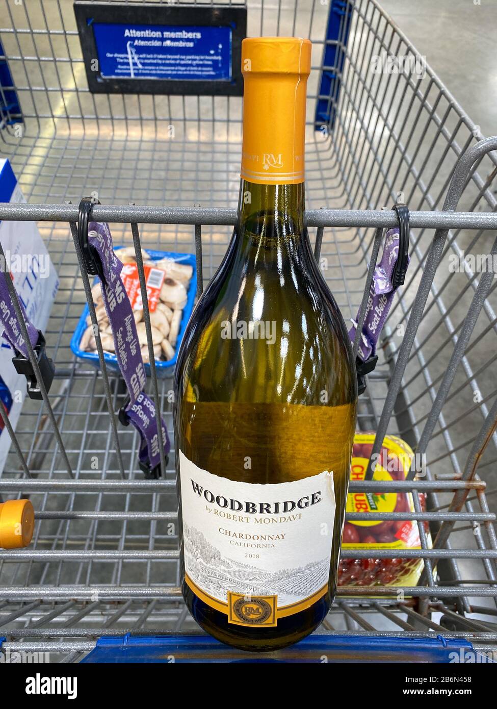 Orlando,FL/USA-3/2/20: A cart with a bottle of Woodbridge Robert Mondavi Chardonnay wine at a Sams Club in Orlando, Florida. Stock Photo