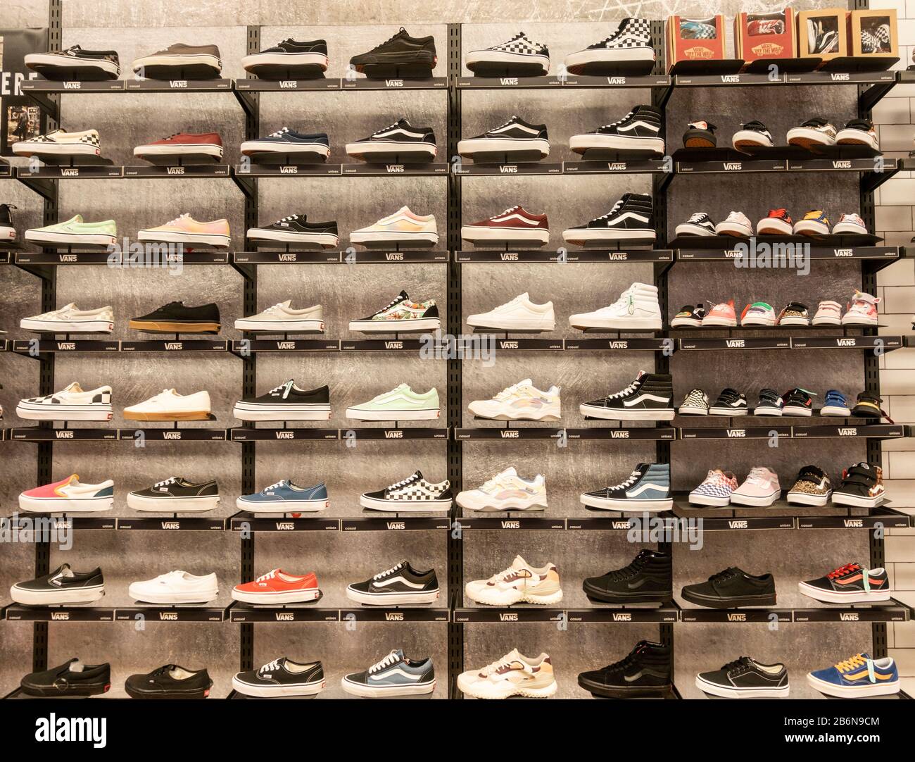 Vans footwear display in department store Stock Photo - Alamy