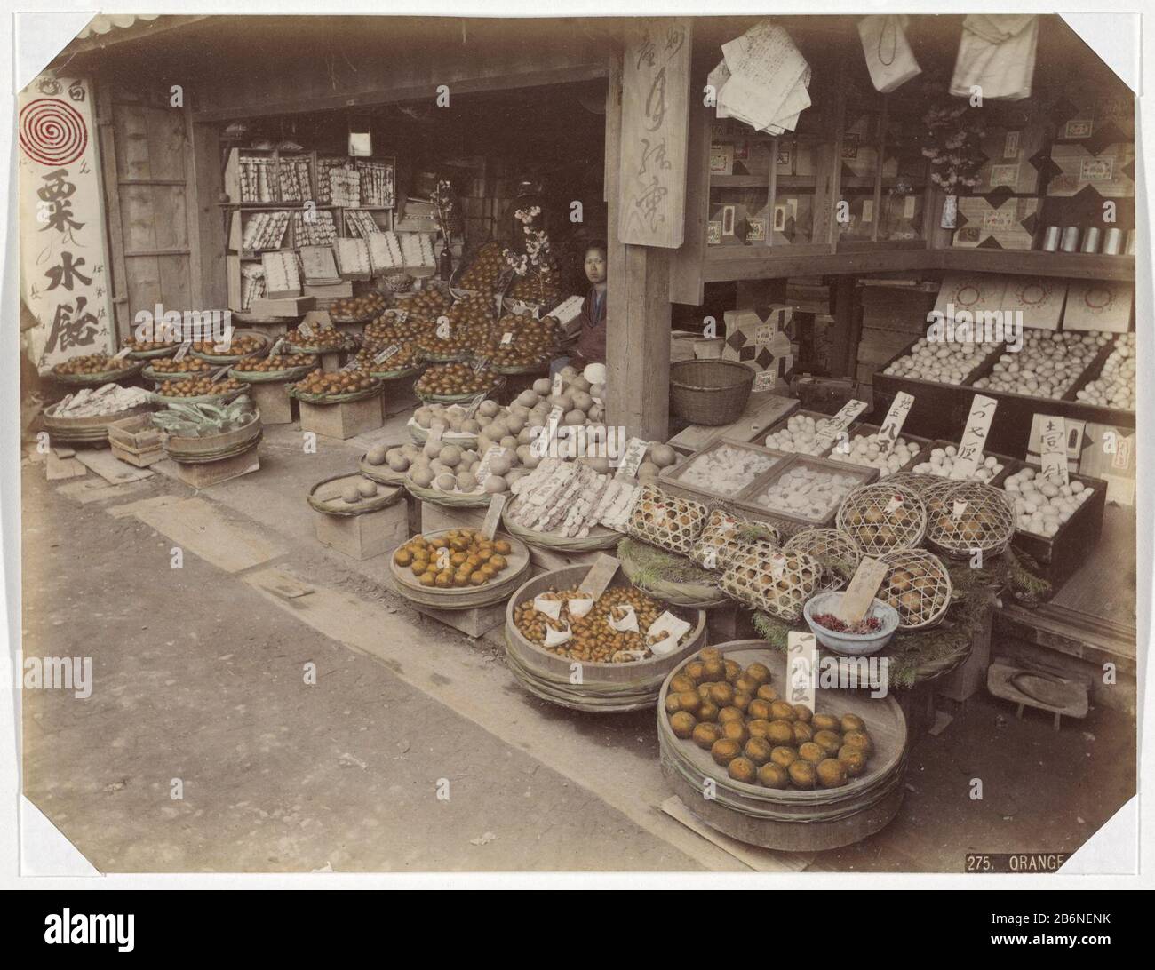 Fruitwinkel in Japan Orange Shop (titel op object) Part of with 69 pictures of a trip Japan. Manufacturer : photographer: anonymous place manufacture: Japan Date: 1890 - 1894 Physical features: hand-colored