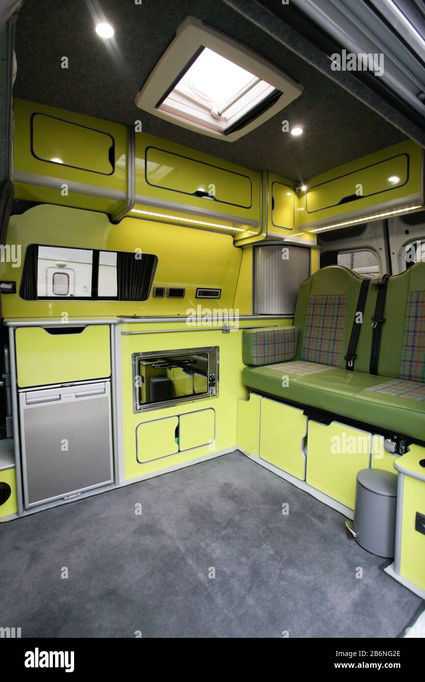 Interior of bright modern campervan conversion Stock Photo
