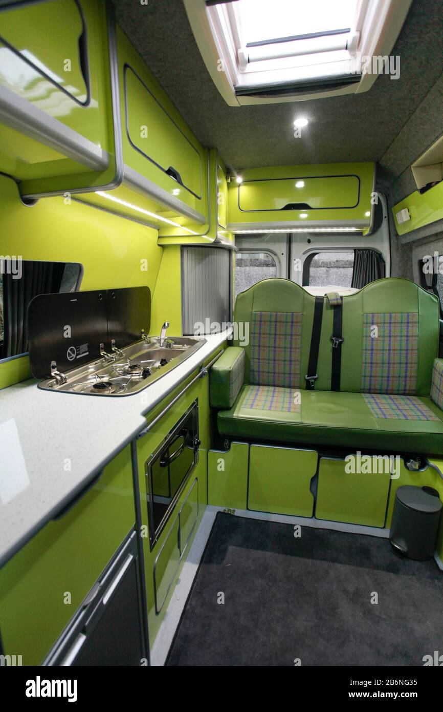 Interior of bright modern campervan conversion Stock Photo