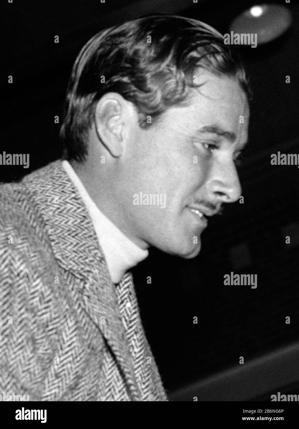 Vintage photo of Australian-born movie star Errol Flynn (1909 – 1959). The photo by Harris & Ewing was taken on January 25 1939 at a horseshow held at Fort Myer, Virginia, as part of birthday celebrations for President Franklin D Roosevelt. Stock Photo