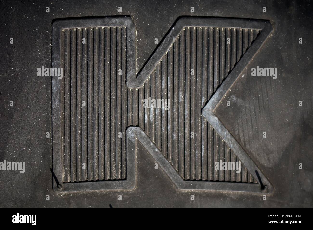 detail of the letter "K" engraved on a wheel of a vehicle Stock Photo Alamy