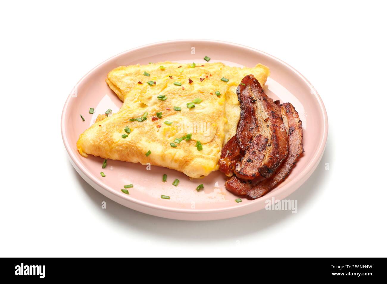Plate with omelette and bacon isolated on white background Stock Photo