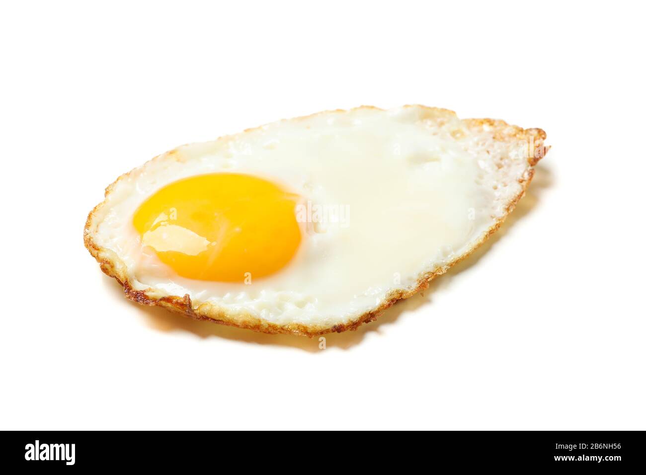 Delicious fried egg isolated on white background Stock Photo - Alamy