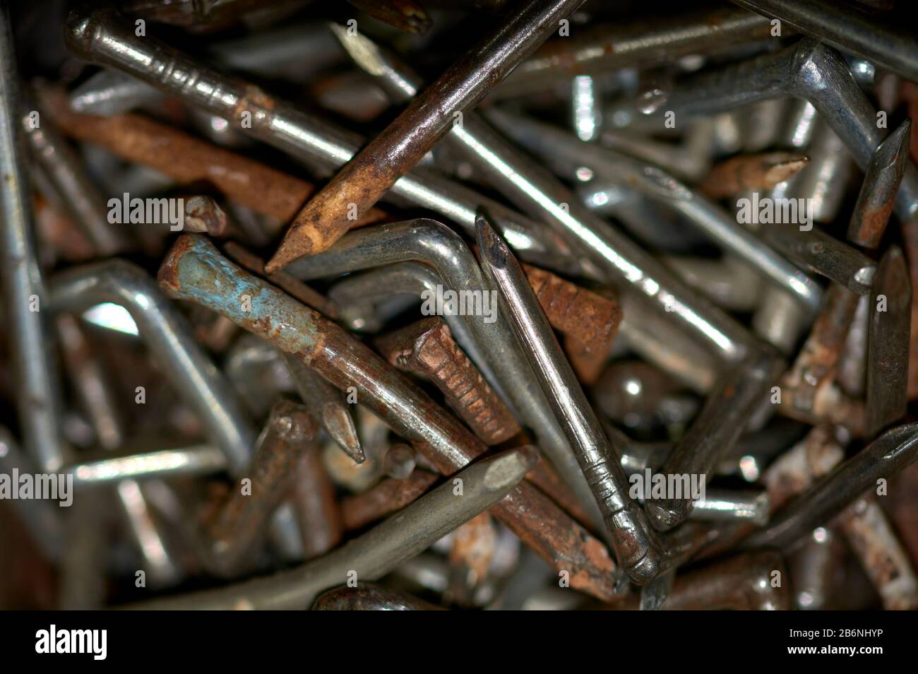 detail of a set set of old and rusty hook nails Stock Photo Alamy