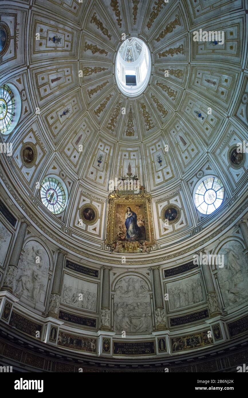 Vertical shot of the Capitular Room dome, at the Cathedral, with the Murillo painting of the Immaculate Virgin Mary, Seville, Spain Stock Photo