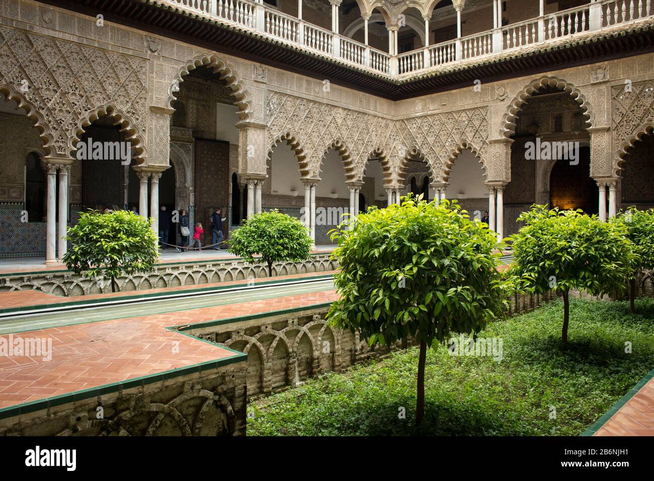 Mudejar style Doncellas courtyard of Pedro el Cruel Palace in the Real Alcazar, Seville, Spain Stock Photo