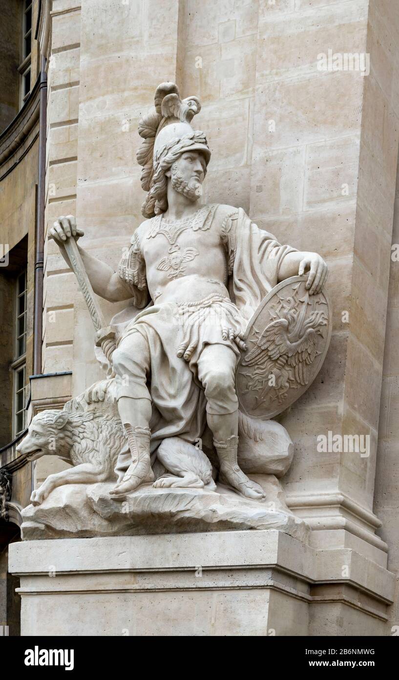 An antique male statue at the entrance to the Army Museum at Les Invalides complex, Paris, France Stock Photo