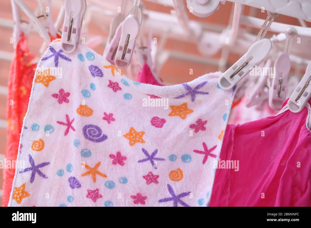 baby cloths drying outdoor, close up Stock Photo Alamy