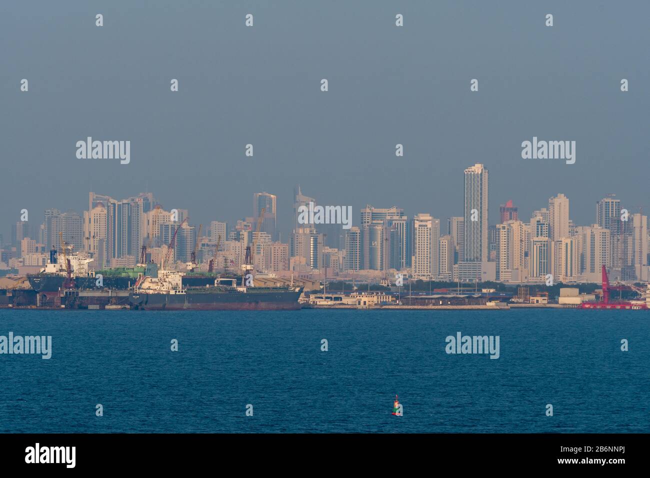 View over the Ocean to the Manamah skyline in Bahrain Stock Photo