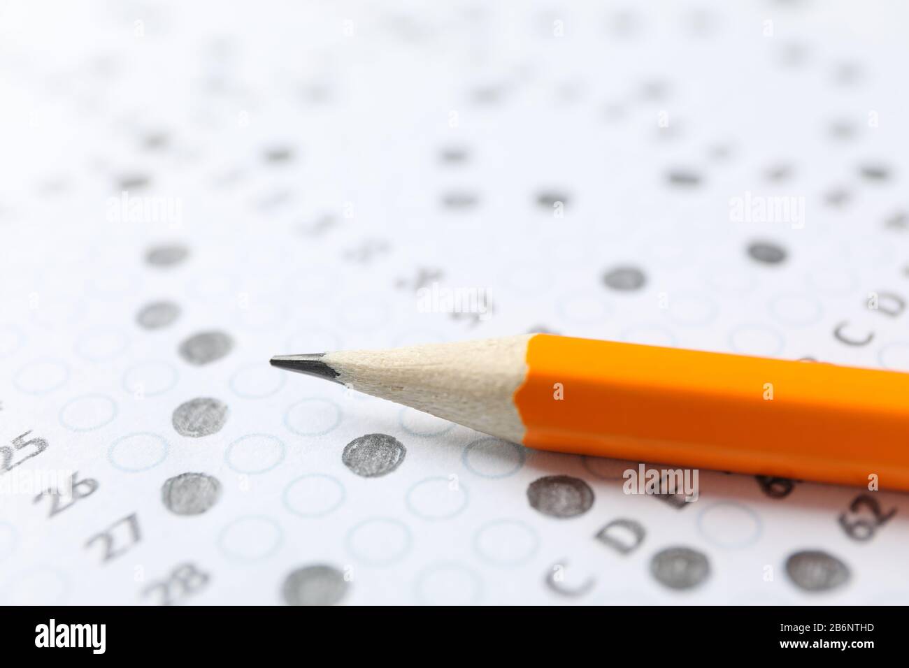 Test score sheet with answers and pencil, close up Stock Photo