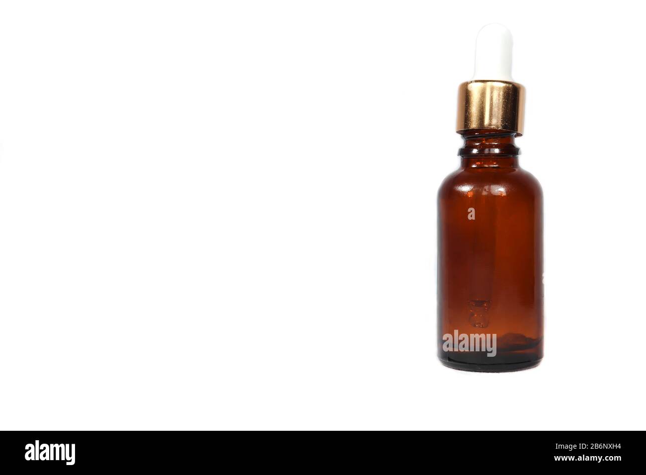 Brown glass bottle with eye dropper Stock Photo Alamy