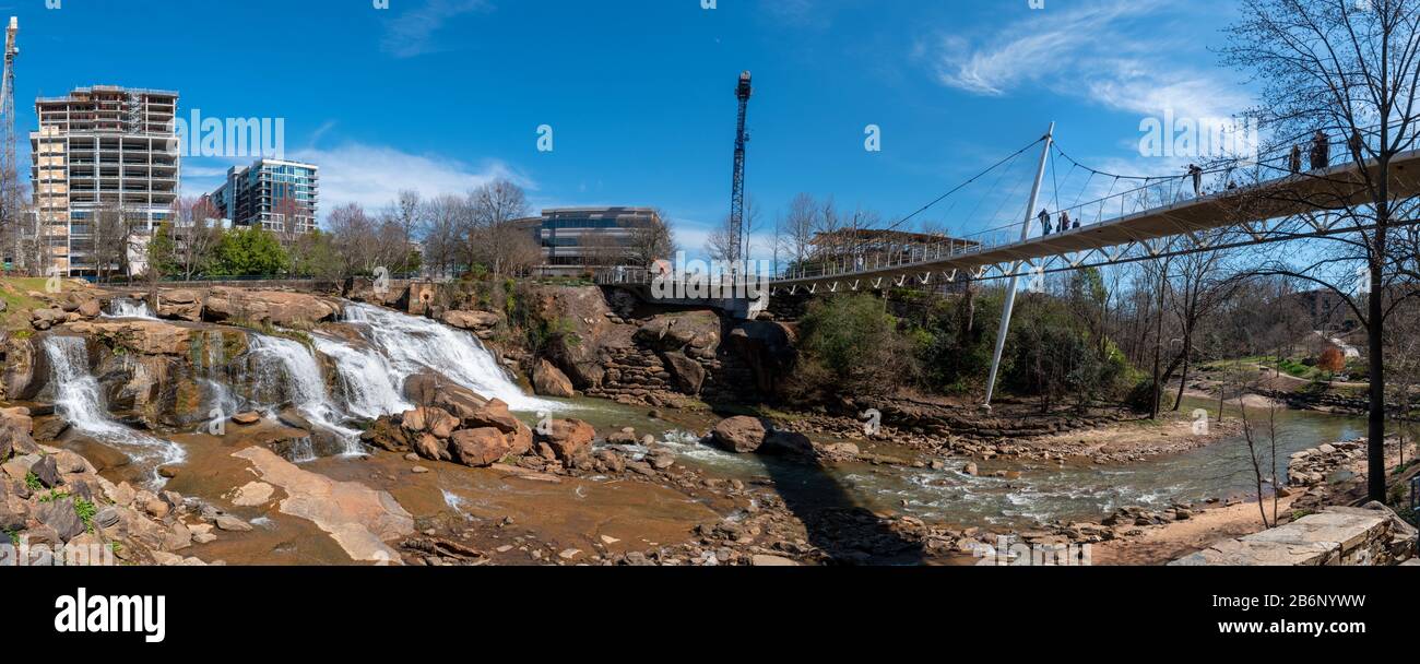 A panoramic view of the Liberty Bridge crossing the Reedy River Falls in Greenville, South Carolina Stock Photo