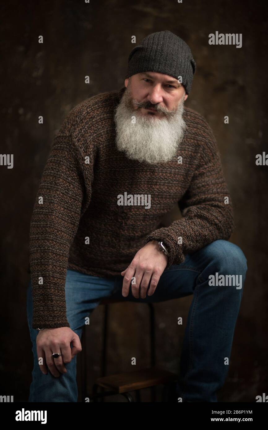 Studio portrait of a man with a mustache and beard hi-res stock ...