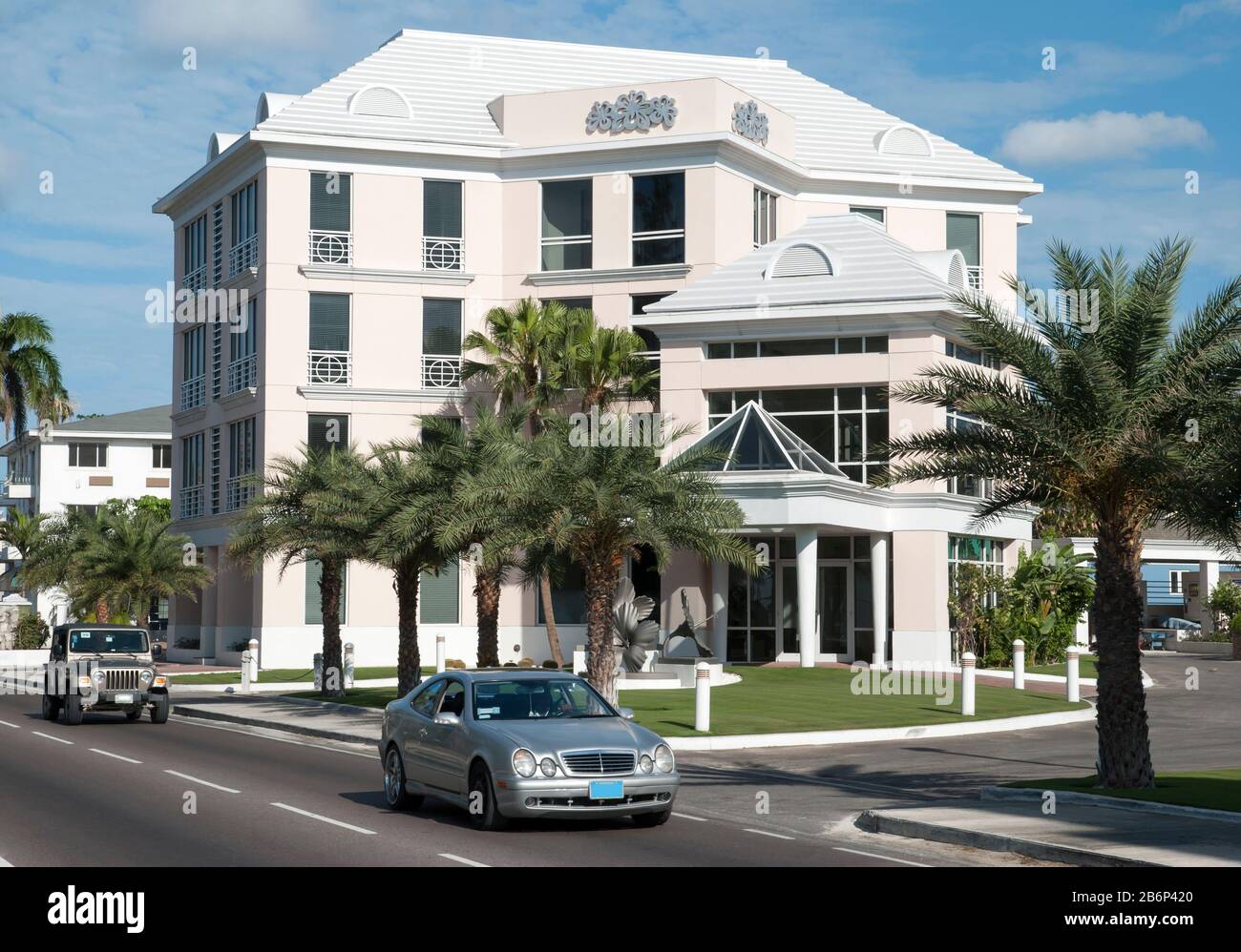 Cars passing by along Bay Street in Nassau, the capital of the Bahamas