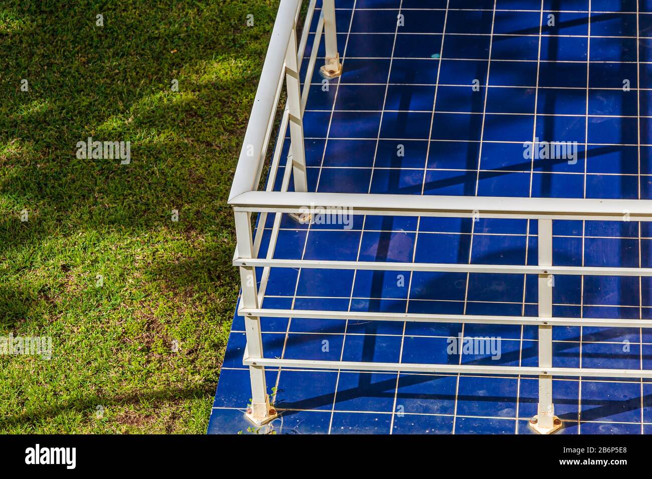 Terrace with blue tiled flooring on the backyard Stock Photo