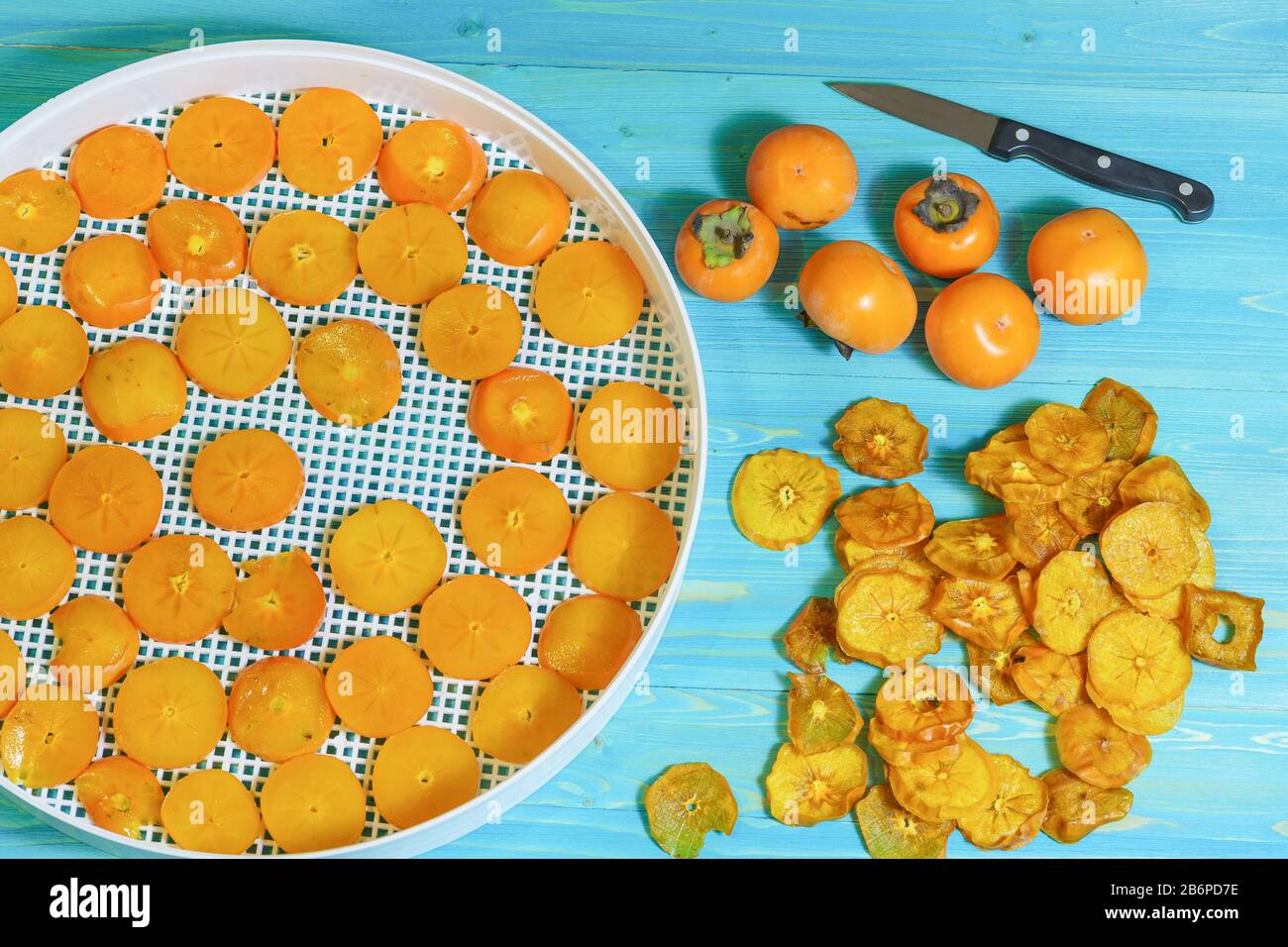 Seasonal harvesting of persimmon fruits (lat. Diospyros) for longterm