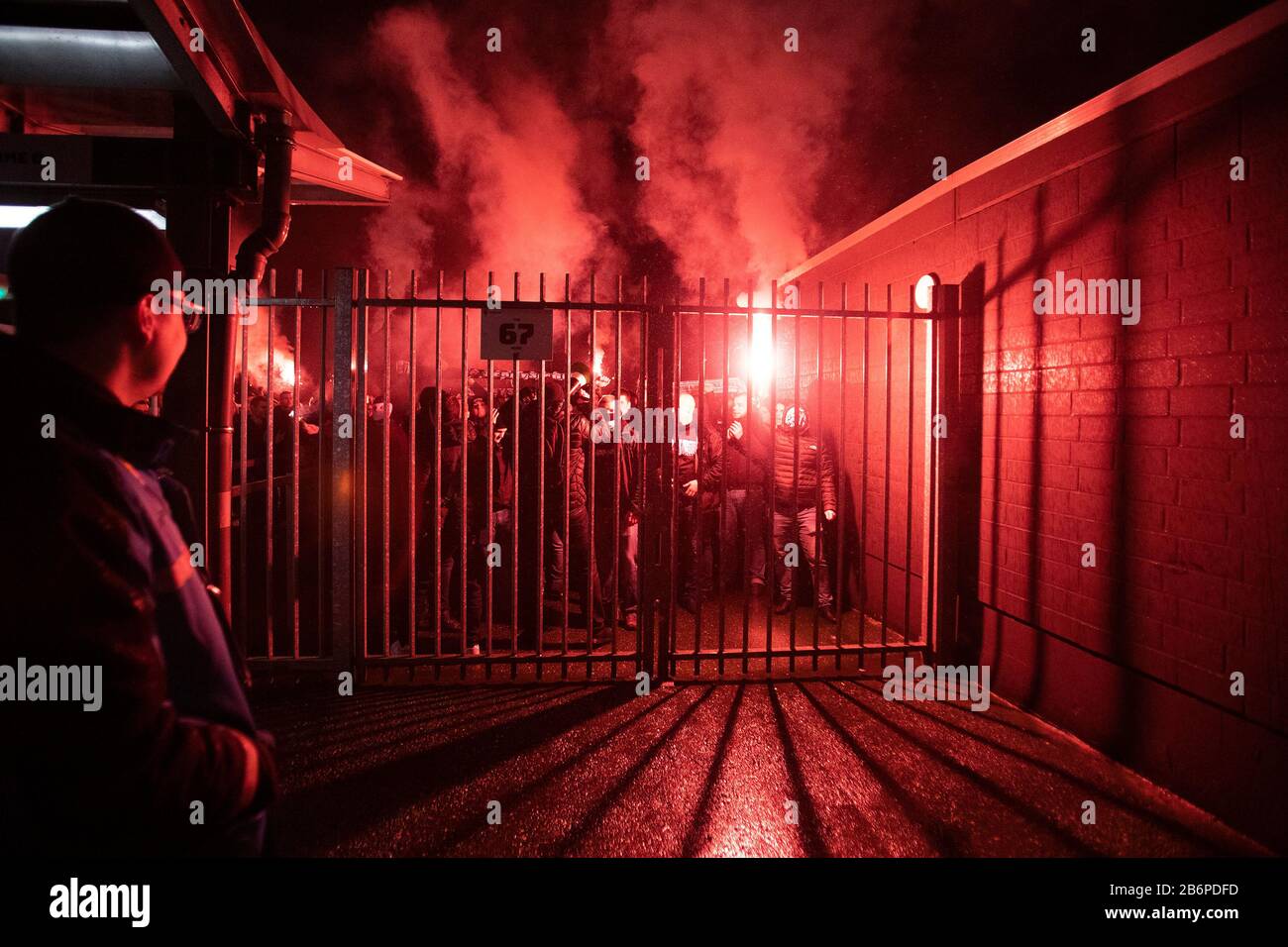 Monchengladach, Germany. 11th Mar, 2020. Fans of Gladbach celebrate the victory with team outside the stadium after the Bundesliga match Borussia Mönchengladbach vs. 1.FC Köln in the season 2019/2020 (Geisterspiel, ghost game, coronavirus) DFL regulations prohibit any use of photographs as image sequences and/or quasi-video. Credit: Mika Volkmann/Alamy Live News Stock Photo