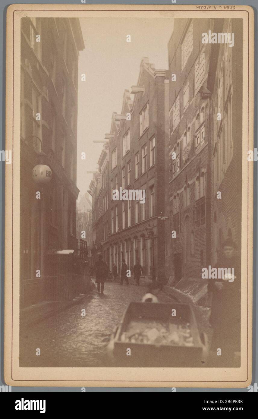 Gezicht op de Nes bij de Lombartsteeg in Amsterdam Gezicht op de Nes bij de Lombartsteeg in Amsterdam Object Type : kabinetfoto Objectnummer: RP-F-00-752 Inscriptions / Merken: opschrift, verso, handgeschreven: ‘Gezicht in de Nes bij de Lombardsteeg Ziende op de Lombard en op de Kantoren van de Brakke Grond.’naam, verso, gestempeld: ‘Vosmaer’nummer, verso, handgeschreven: ‘437’ Manufacturer : fotograaf: Gebr. van R. (vermeld op object)uitgever: Gebr. van R. (vermeld op object)Plaats manufacture: Amsterdam Dating: ca. 1860 - ca. 1880 Material: fotopapier karton Techniek: albuminedruk Dimensions Stock Photo