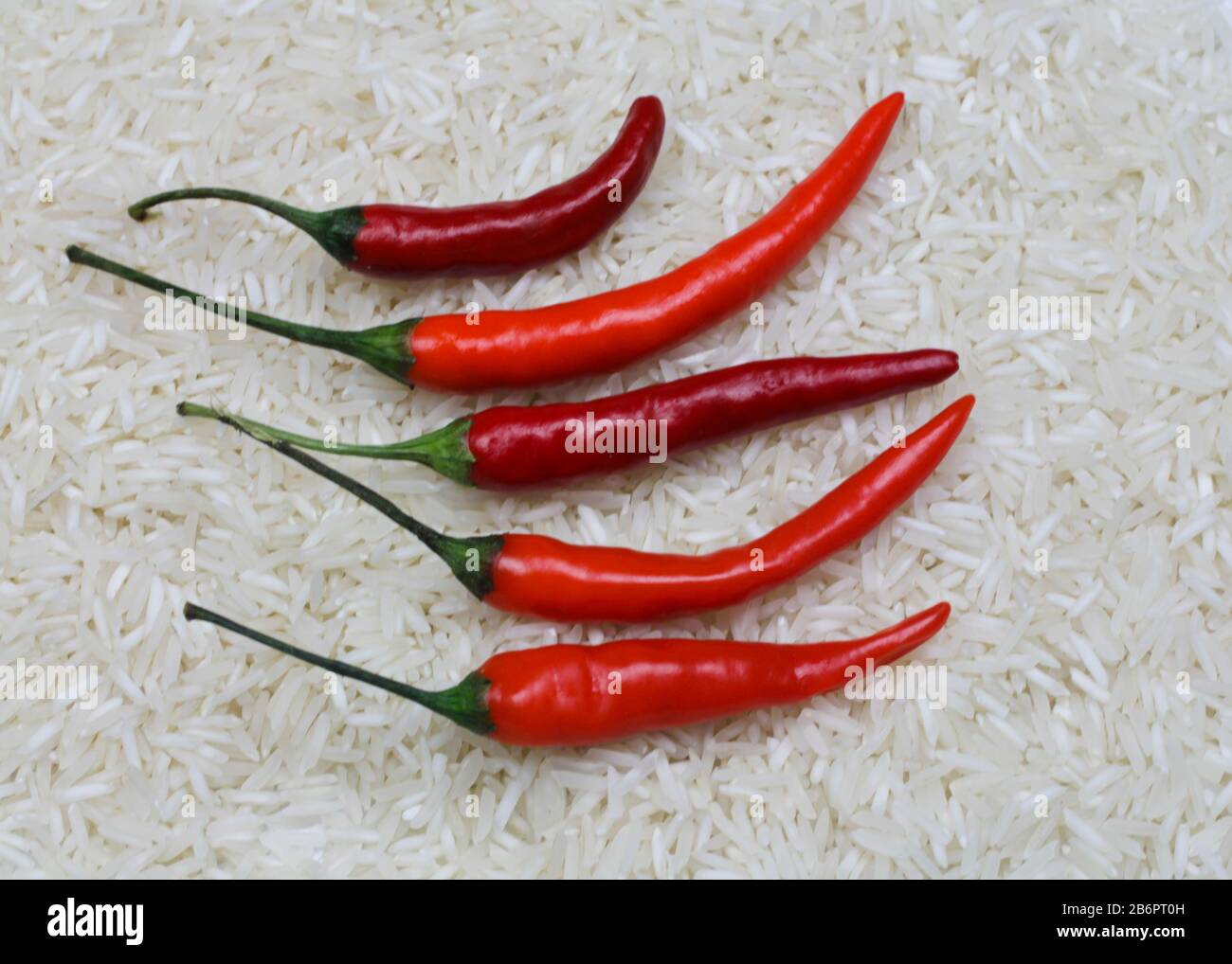 Red Chillis on Rice Stock Photo - Alamy