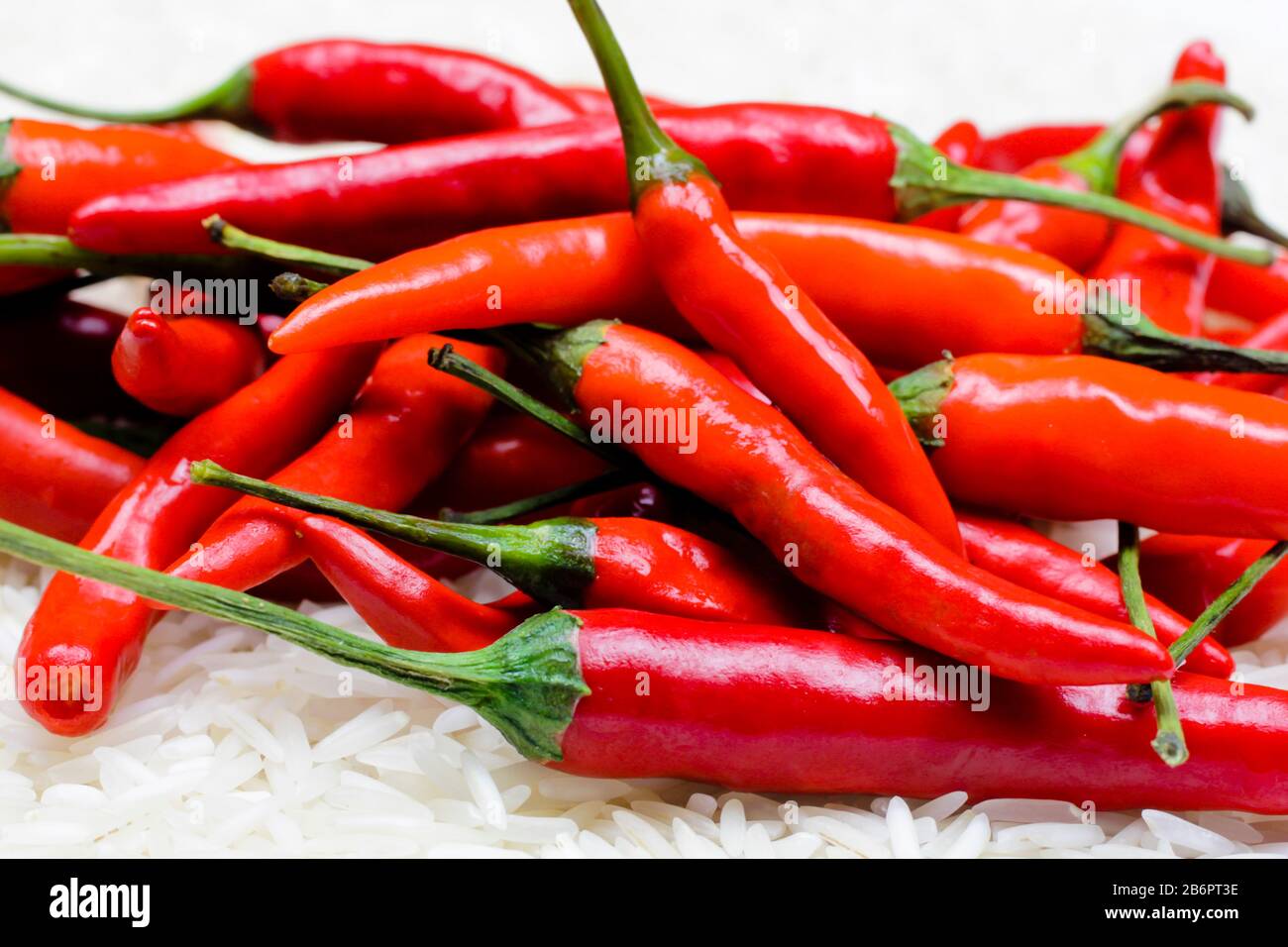 Red Chillis on Rice Stock Photo - Alamy