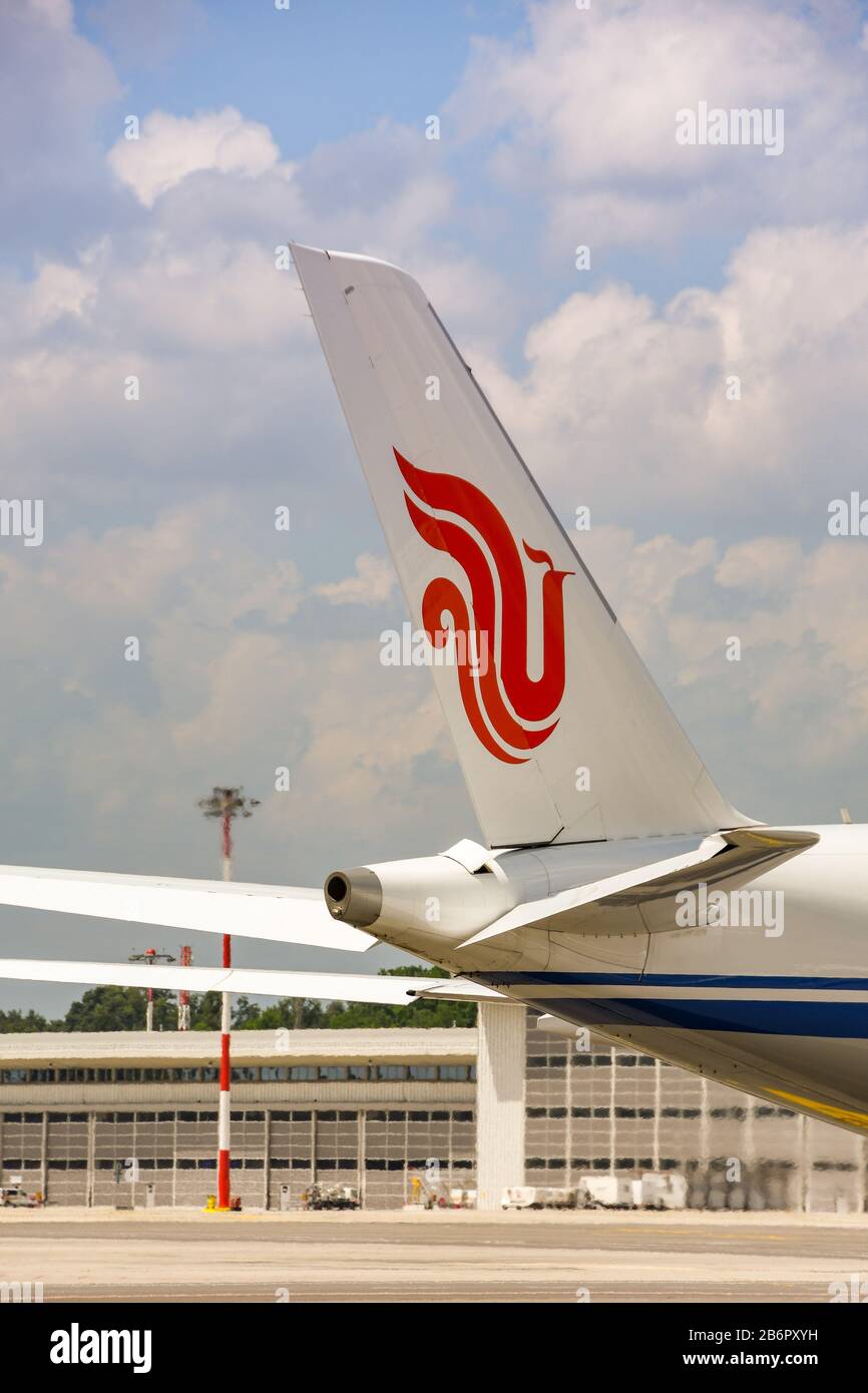 MILAN, ITALY - JUNE 2019: Tail fin of an Air China Airbus A350 900 jet at Milan Malpensa airport. Stock Photo