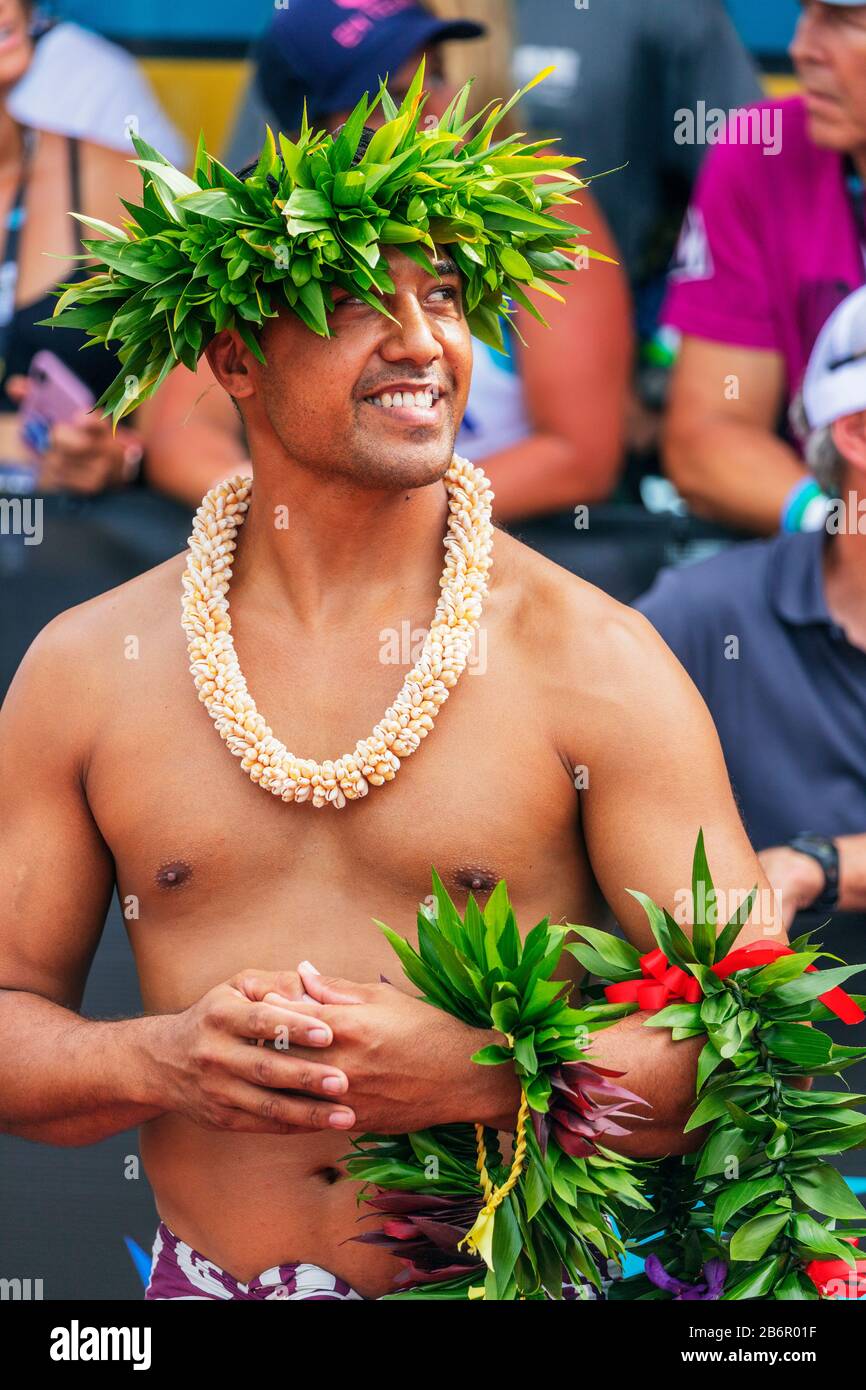 USA, Hawaii, Big Island, Kona, native Hawaiian in traditional clothing at the Ironman Kona triathlon Stock Photo