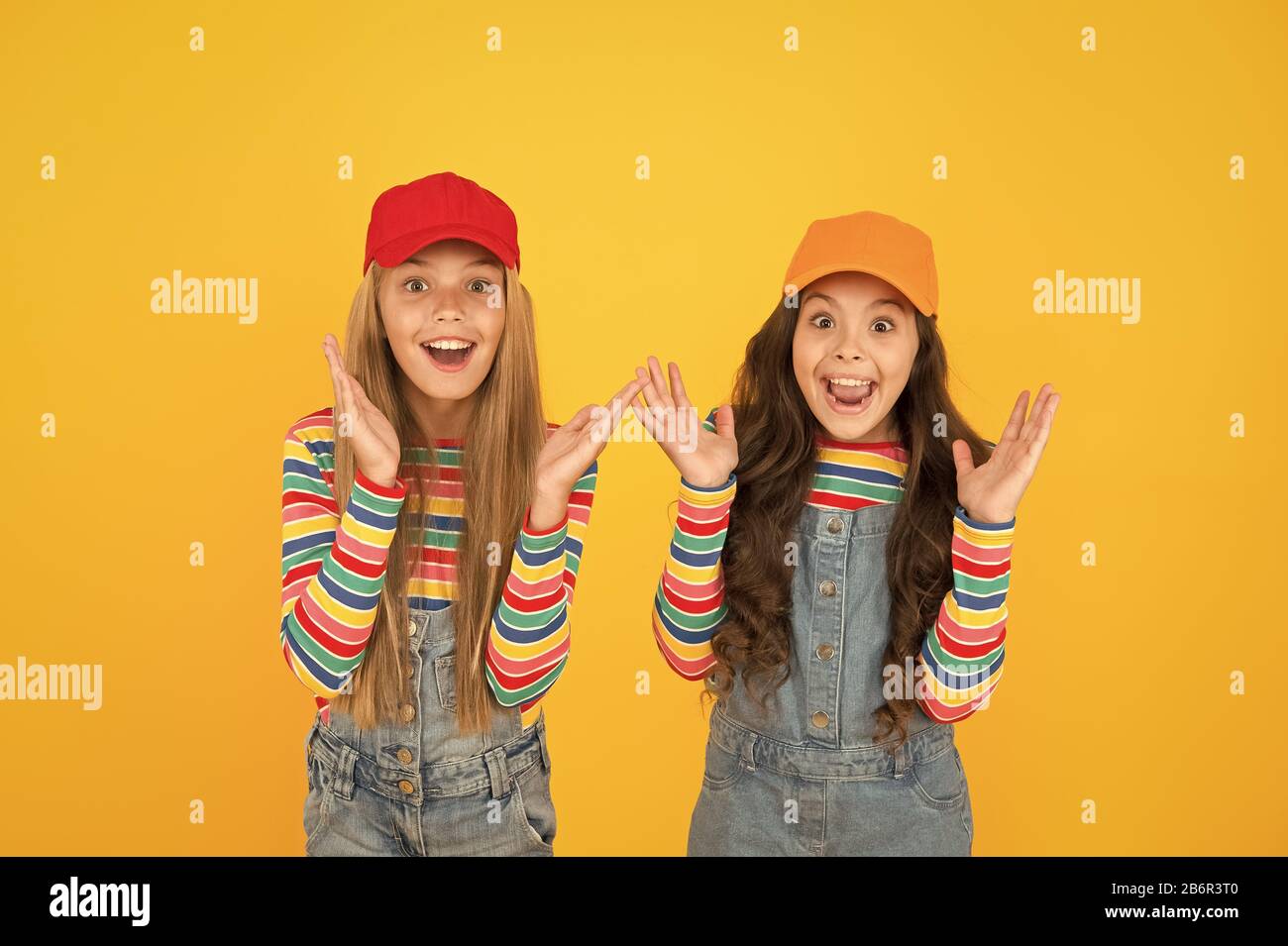 Excited kids face. Amazed expression, cheerful and glad. Amazed child with  open mouth on yellow background, surprise Stock Photo - Alamy