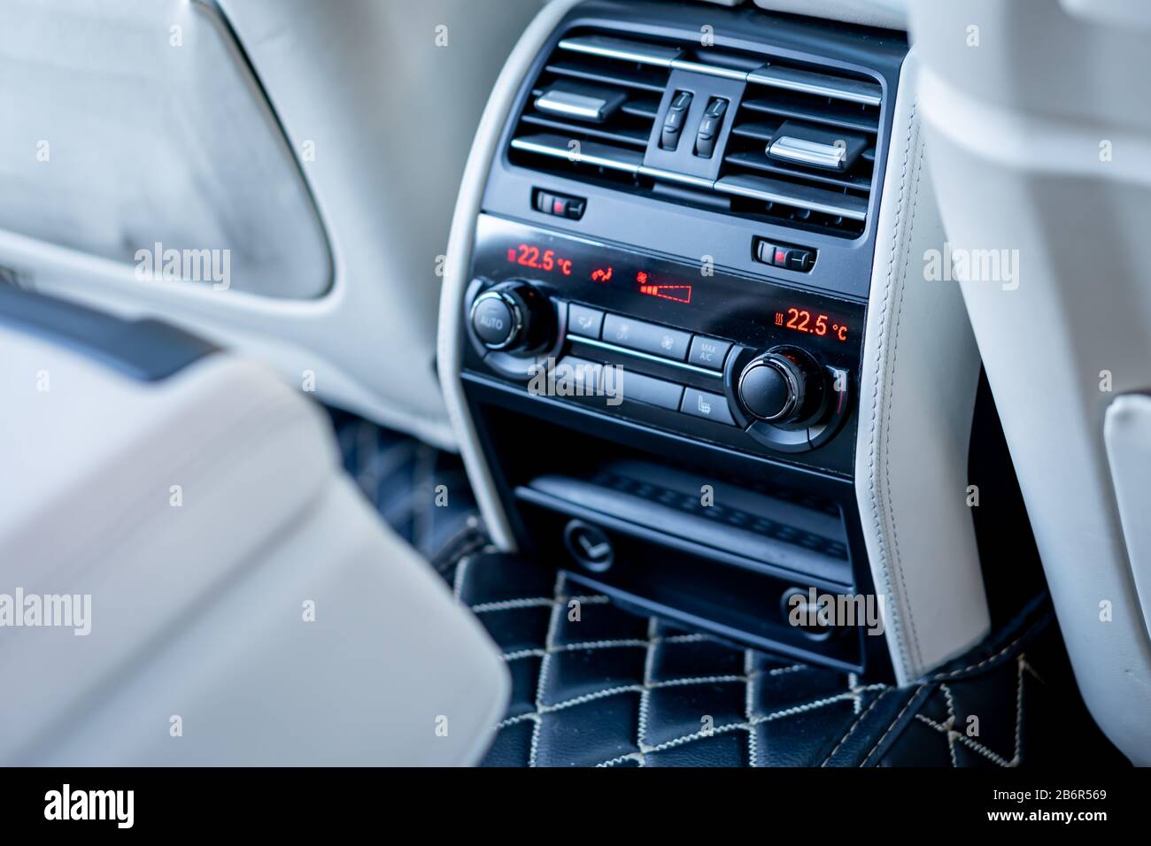 Bmw 750d climate unit and automatic gear knob, close up photo, heated