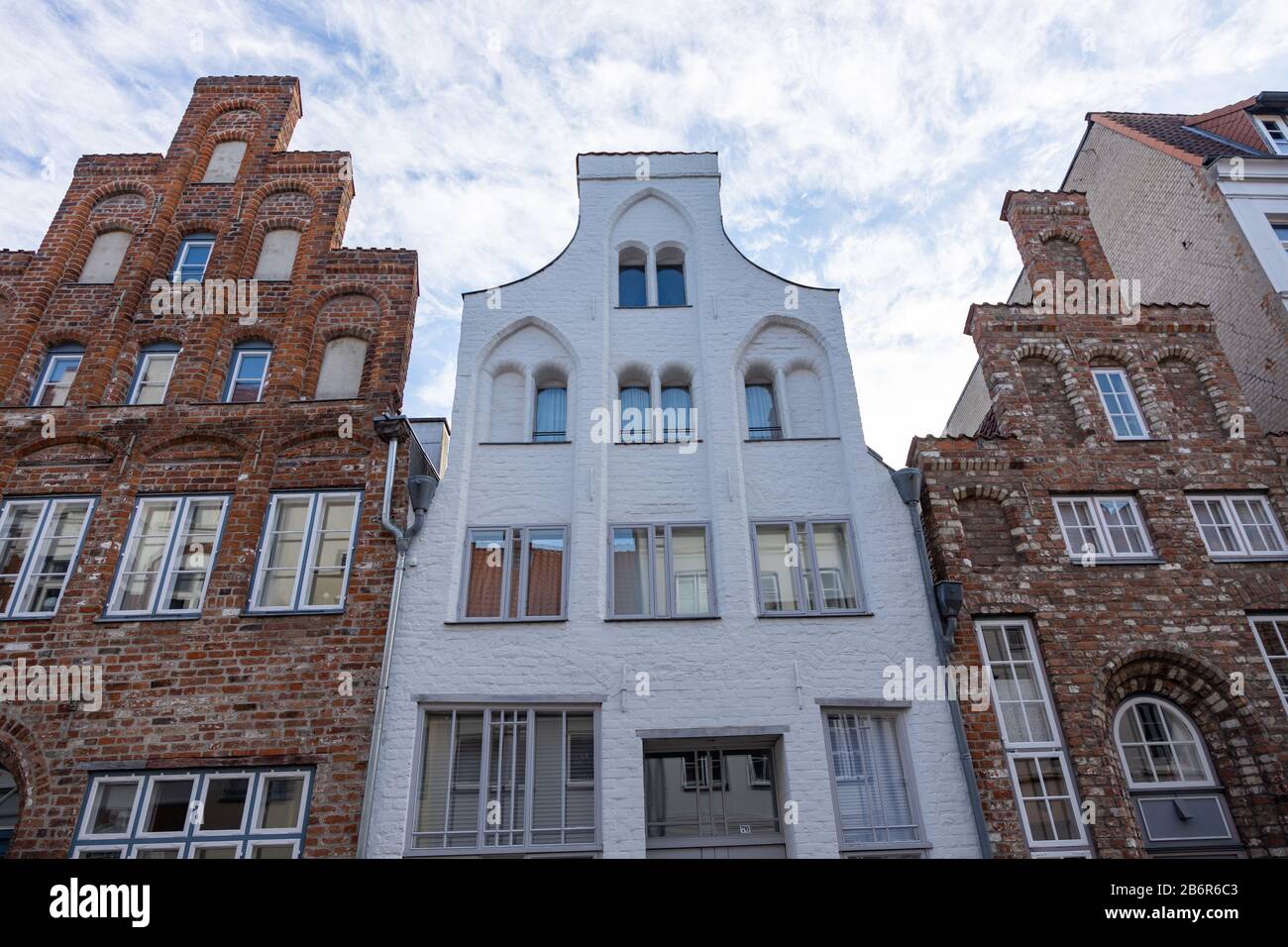 Lubeck, Germany, 10-06-2019 historic buildings with gothic brick facades in the old town Stock Photo