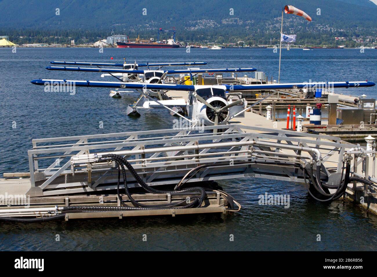 Three Harbour Air DHC-3 de Havilland Turbine Single Otter seaplanes at Coal Harbour, Vancouver, BC, Canada Stock Photo