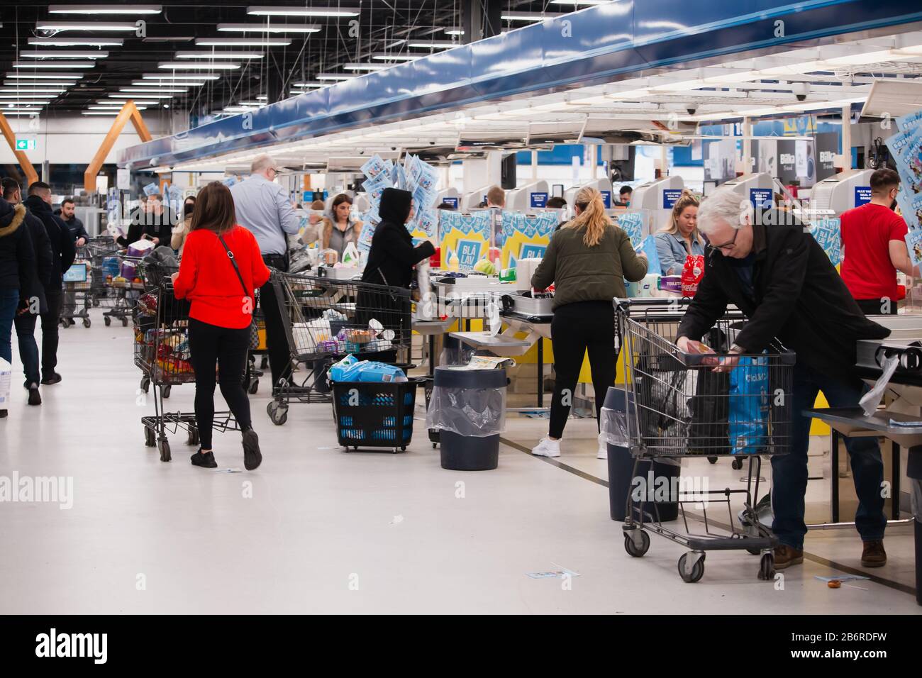 Ishoj, Denmark - March 12 2020: People rushing to supermarkets after in Denmark was announced pandemic Stock Photo