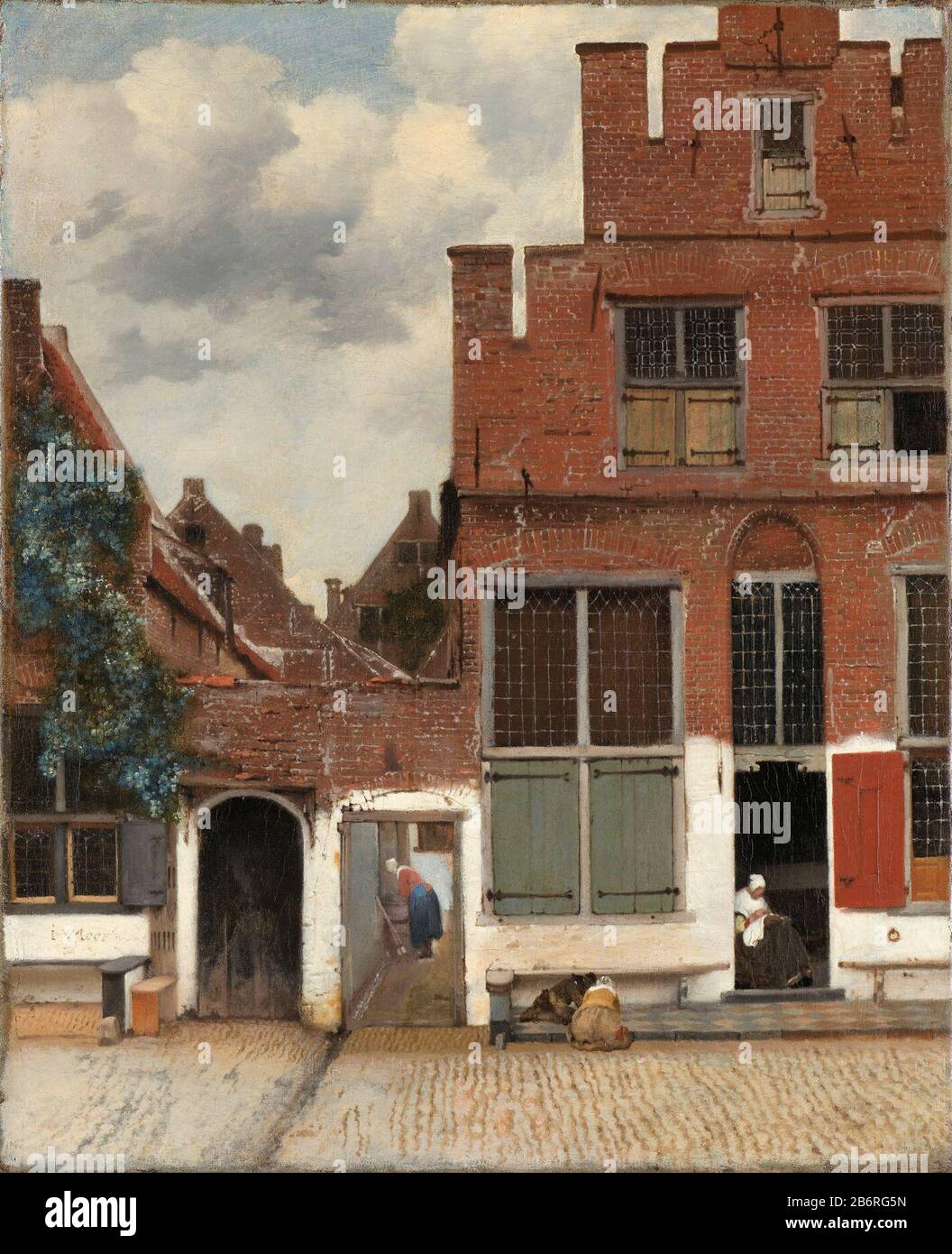 View of houses in Delft, known as 'the street'. The facades of several houses on a street in Delft. Between the houses an alley where a woman is bent over a washtub. In the open door of the house on the right is a woman needlework, left the house on the sidewalk two playing kinderen. Manufacturer : painter Johannes Vermeer Dating: ca. 1658 Physical characteristics: oil on canvas material: canvas oil painting Dimensions: canvas size: h 54 3 cm. B × 44 cm. D × 9 cm.  Subject: street civic architecture; edifices; dwellingschildren's games and plays (+ out of doors (sports, games, etc).) home sewi Stock Photo