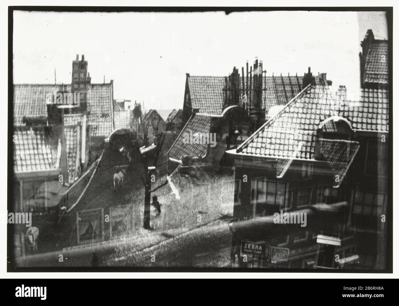Gezicht over daken in Amsterdam View over rooftops in Amsterdam Property Type: photographs Item number: RP-F K89494 Manufacturer : photographer George Hendrik Breitner Publisher: Harm Botman (listed property) Place manufacture: Photographer: Amsterdam Publisher: Netherlands Date: ca. 1890 - ca. 1910 Physical features: gelatin silver print material: paper Technique: gelatin silver print dimensions: sheet: h 50.5 cm. B × 39.8 cm. Photo: H 40.0 cm. B × 27.2 cm. Notes Modern print negative BR 1245 (collection RKD) .Onderwerp Stock Photo